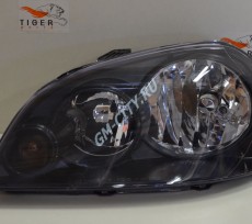 Фара левая седан, универсал (черная)